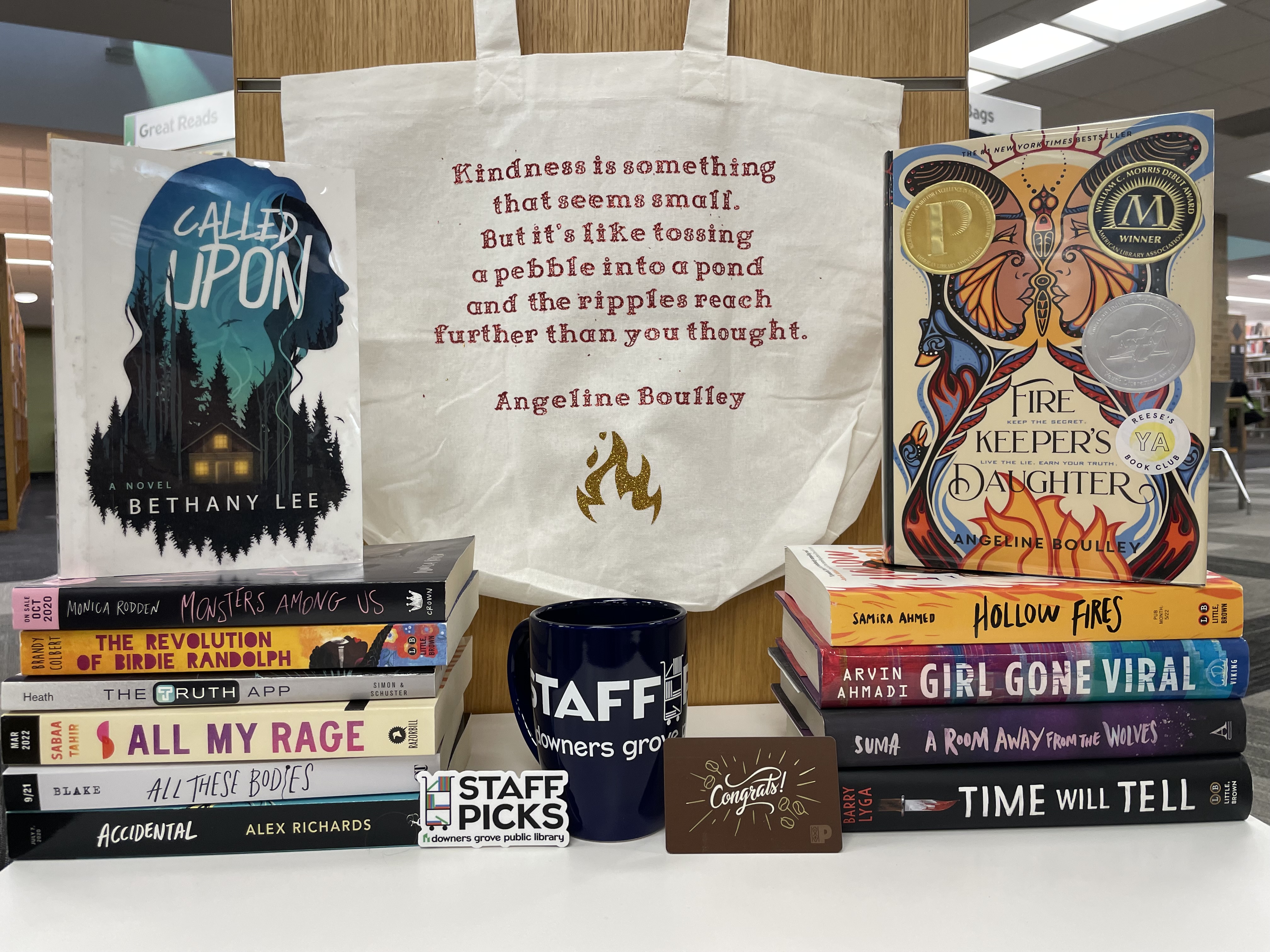 June raffle prize includes books, mug, and tote bag