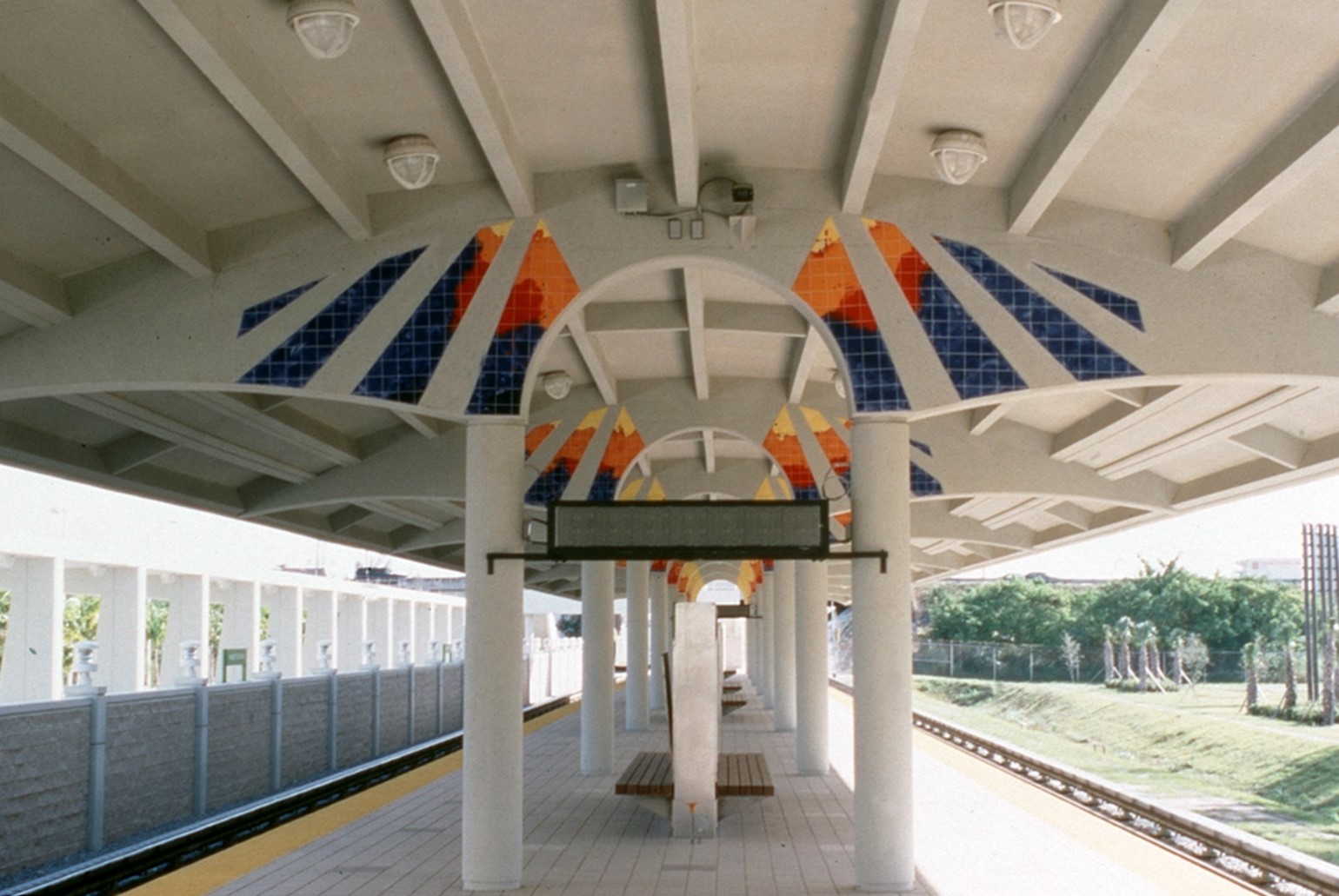 Mural installed above train station, opposite view