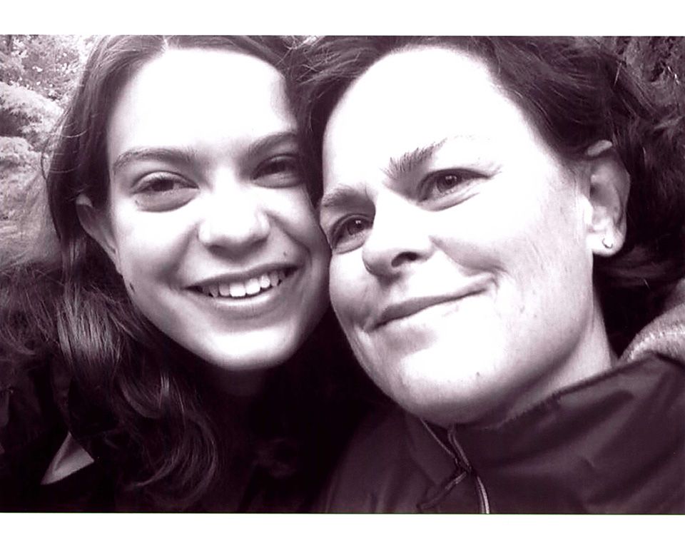Portrait of mother and daugther smiling for the camera