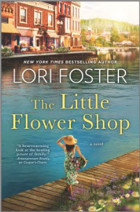 Hold a copy of The Little Flower Shop