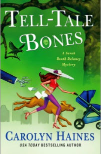 Hold a copy of Tell-Tale Bones