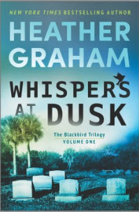 Hold a copy of Whispers at Dusk