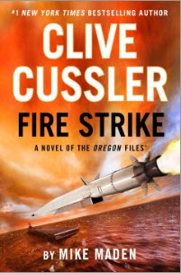 Hold a copy of Clive Cussler Fire Strike