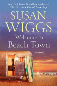 Hold a copy of Welcome to Beach Town