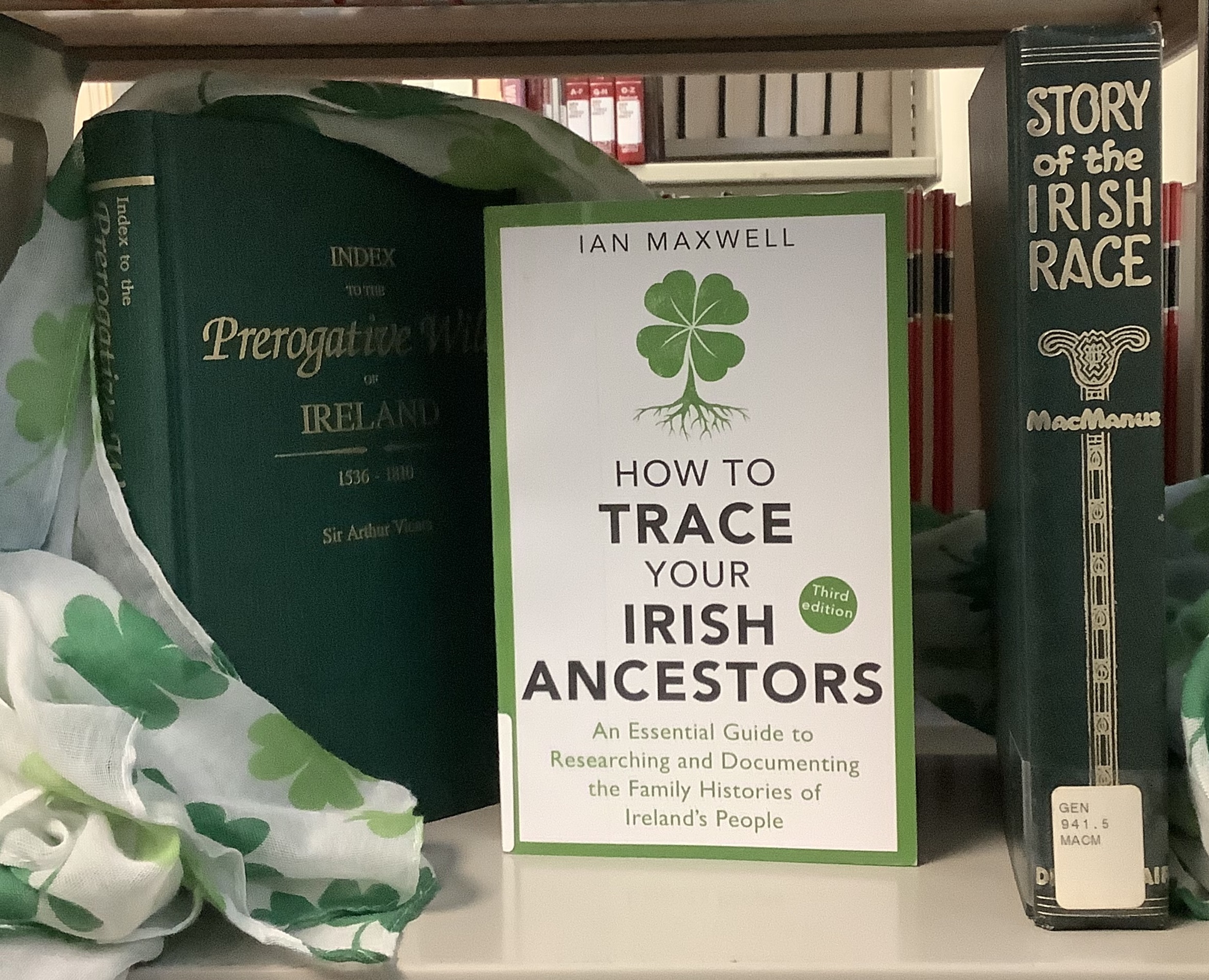 Book Index to the Prerogative of Ireland, How to Trace your Irish Ancestors, and Story of the Irish Race draped with a four leaf clover scarf